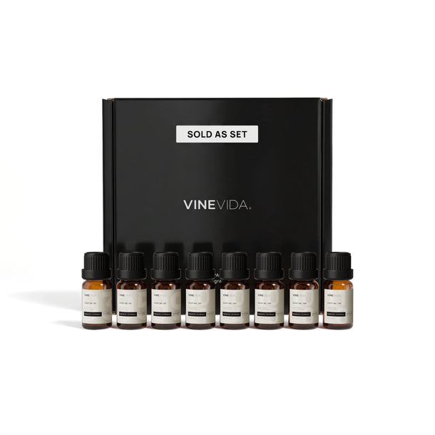 Autumn Diffuser Fragrance Oil Set - 8 VINEVIDA 10mL amber glass oil bottles lined up in front of black "Sold as Set" gift box
