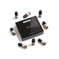 Autumn Diffuser Fragrance Oil Set - 8 VINEVIDA 10mL amber glass oil bottles arranged around closed black "Sold as Set" gift box, flat lay overhead angle