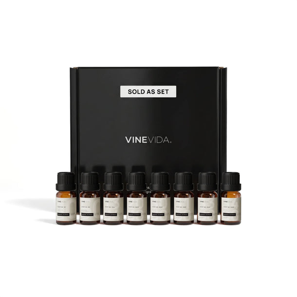 Masculine Diffuser Fragrance Oil Set - 8 VINEVIDA 10mL amber glass oil bottles lined up in front of black "Sold as Set" gift box