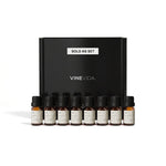 Christmas Soap & Candle Fragrance Oil Set - 8 VINEVIDA 10mL amber glass oil bottles lined up in front of black "Sold as Set" gift box