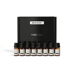 Summer Diffuser Fragrance Oil Set - 8 VINEVIDA 10mL amber glass oil bottles lined up in front of black "Sold as Set" gift box